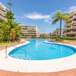 Guadalmina Beach Apartment by Dahlia Group