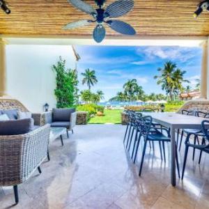Stylish Split-Level Condo with a Shaded Terrace Direct Beach Access and Resort-Style Community Amenities