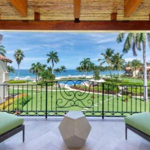 Modern Oceanfront Condo with a Chic Coastal Design Resort-Style Amenities and Direct Beach Access