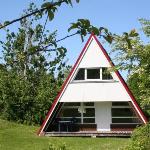 Detached holiday home decorated with wood on the Ostsee Damp