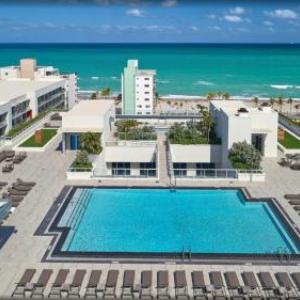 NEW Beachfront Condo-ROOFTOP infinity POOL