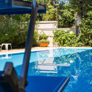 Appartamento a pochi passi dal mare con piscina