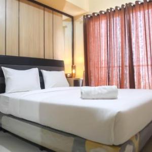 Spacious 1BR at The Oasis Cikarang Apartment By Travelio