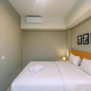 Luxury 1BR Apartment with Golf View at Mustika Golf Residence By Travelio
