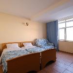 Room with two beds and sea view