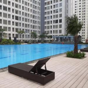 Studio Room Apartment at M-Town Residence near Summarecon Mall Serpong By Travelio