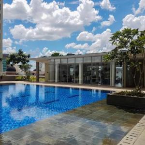 Nice 1BR Apartment at M-Town Signature By Travelio