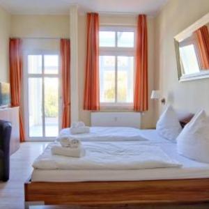 Ferienwohnung 4 Rosenbogen - Familienwohnung mit Wintergarten und Terrasse