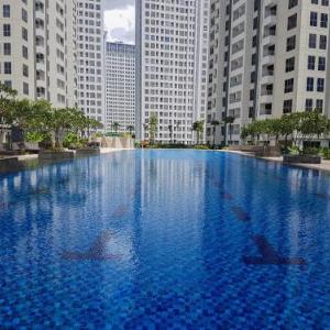 Fully Furnished 2BR Apartment at M-Town Residence By Travelio