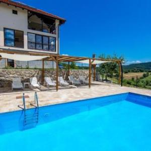 Beautiful apartment in Rakovica w/ Outdoor swimming pool WiFi and 1 Bedrooms