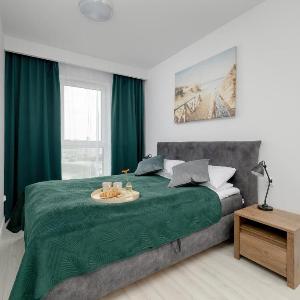 Modern Apartment with Balcony and Parking by Noclegi Renters