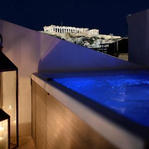 Luxury Athens Apartment | 2 Bedrooms | Apartment Mavis | Spacious Terrace with Hot Tub and Stunning City Views | Athinaidos