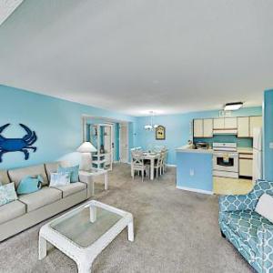 Oceanside Gem with Private Deck Canal Views & Pools condo