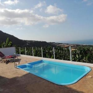 House with 2 bedrooms in Santiago del Teide with wonderful sea view shared pool terrace 3 km from the beach